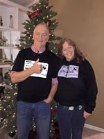 Image may contain: 2 people, people smiling, people standing and indoor